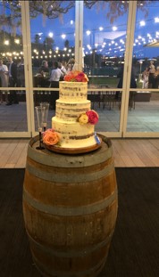 wedding cake on aged barrel