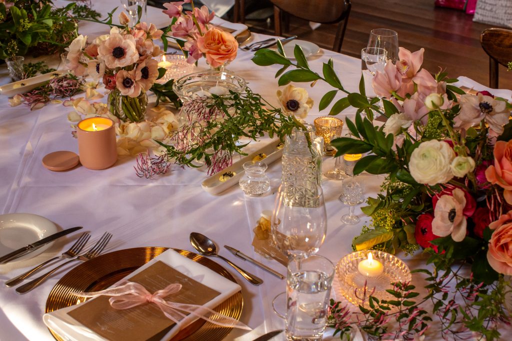 Flower table decorations with candles