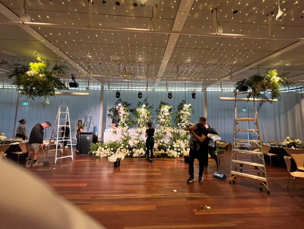 Luxe Unforgettable Events team at work setting up wedding